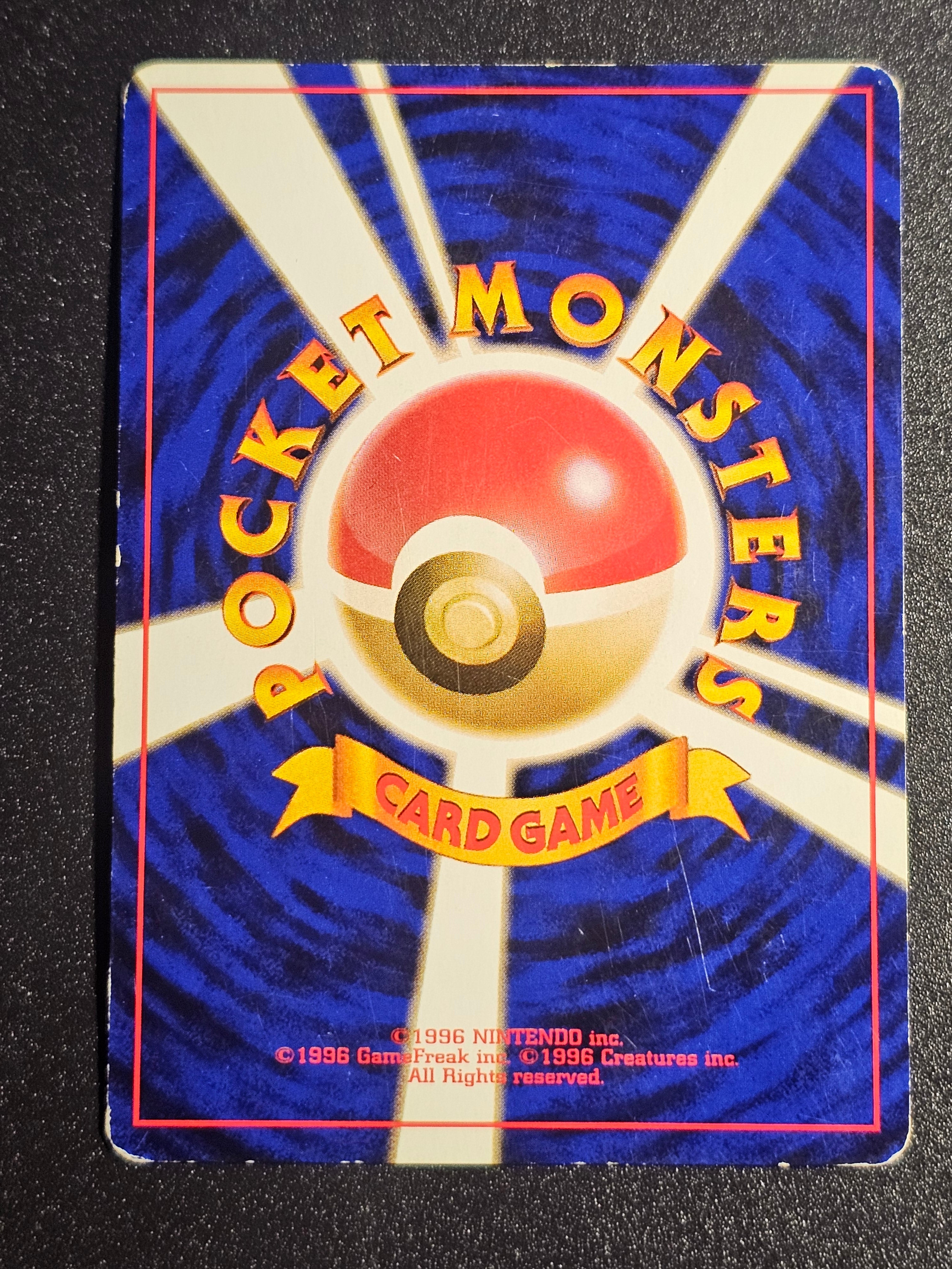 Pokemon TCG - Eevee 133 Team Rocket